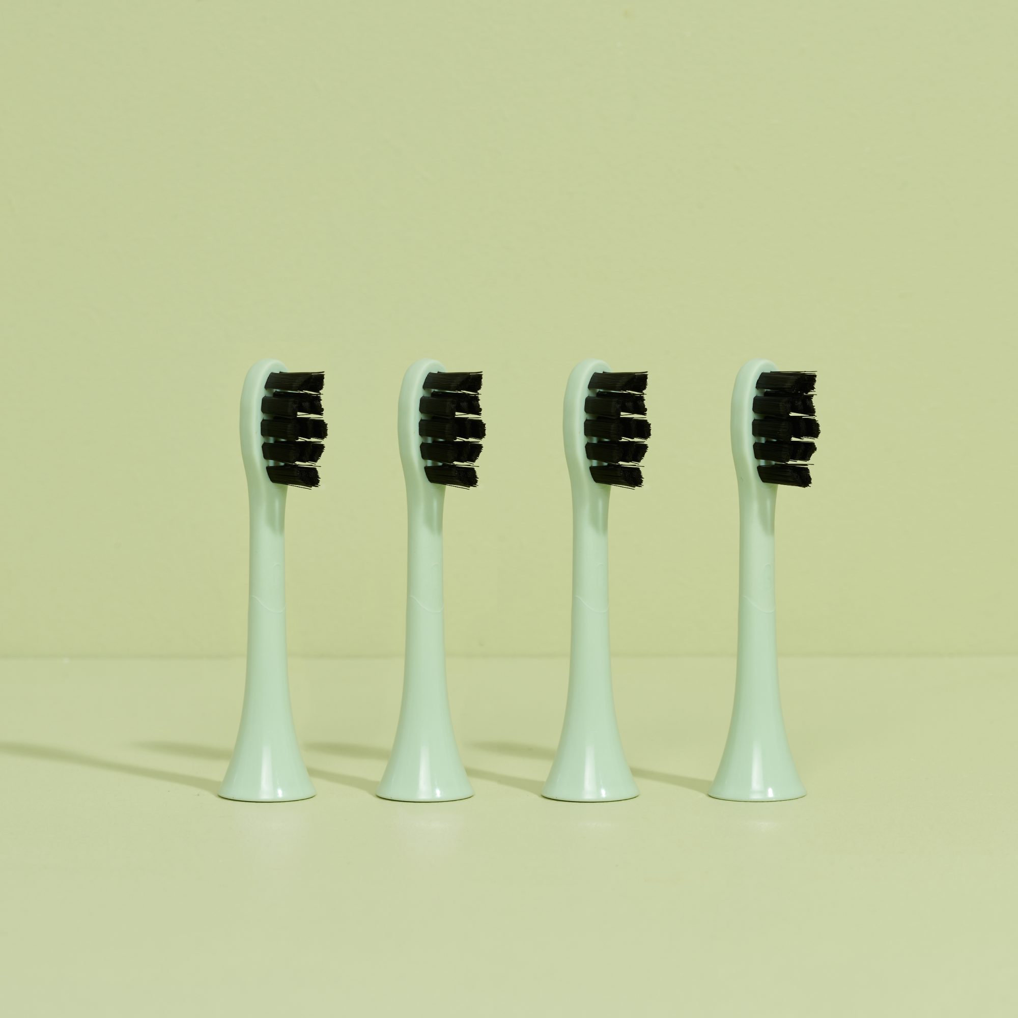 the brush heads green